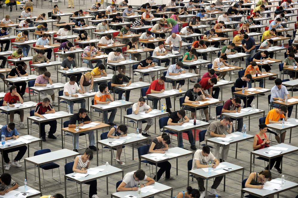 Room of students taking an exam