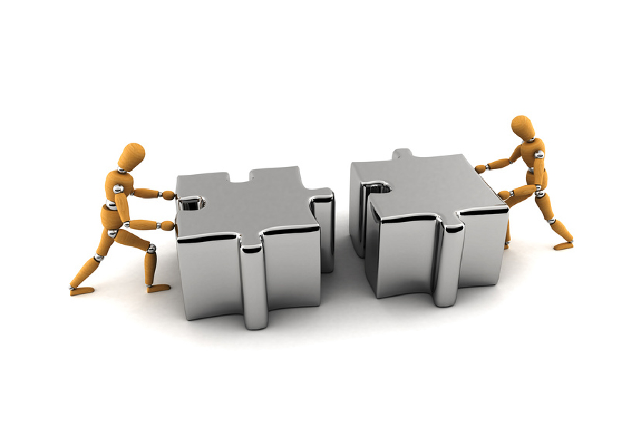 images of 2 figues putting 2 puzzle pieces together