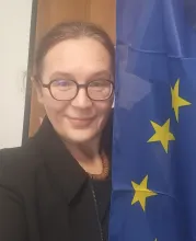 Kasia holding a flag